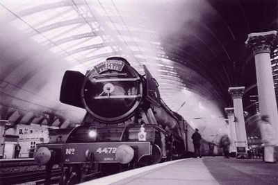 A Black and White lomograpg of the Scarborough Spa Express steam train standing at York station
