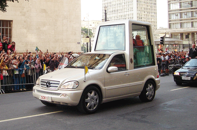 A white Mercedes m-class popemobile (pope mobile) registration number scv1 (SCV 1, S.C.V.1) carrying Pope Benedict XVI